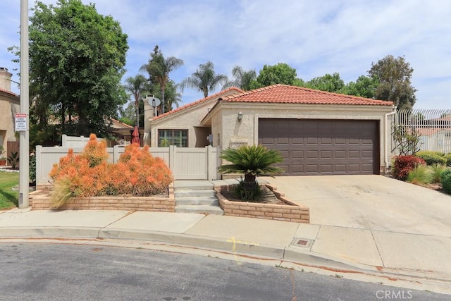 10260 Santa Rosa Ct, Rancho Cucamonga, CA 91730 - mediterranean / spanish-style home with a tiled roof, driveway, stucco siding, and a garage