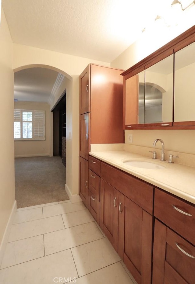 10260 Santa Rosa Ct, Rancho Cucamonga, CA 91730 - bathroom featuring vanity, tile patterned floors, and ornamental molding