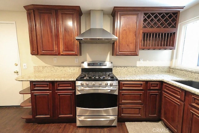 10260 Santa Rosa Ct, Rancho Cucamonga, CA 91730 - kitchen featuring wall chimney exhaust hood, gas range, dark wood finished floors, and dark brown cabinets