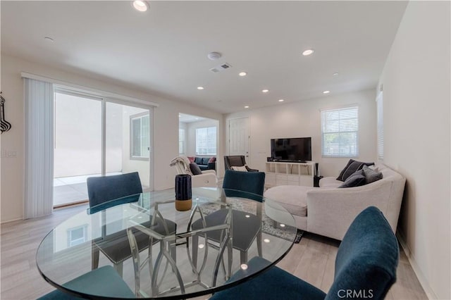 14991 Cavetto Ln, Fontana, CA 92336 - dining space with plenty of natural light, light wood finished floors, recessed lighting, and baseboards
