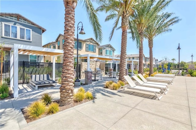 14991 Cavetto Ln, Fontana, CA 92336 - view of patio featuring fence and a residential view