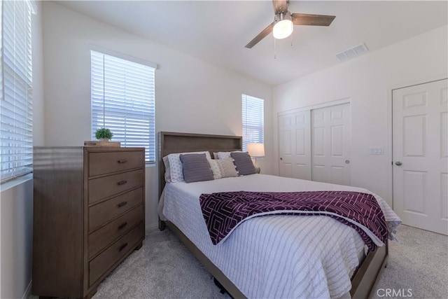 14991 Cavetto Ln, Fontana, CA 92336 - bedroom featuring light carpet, a closet, and a ceiling fan