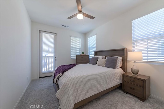 14991 Cavetto Ln, Fontana, CA 92336 - bedroom featuring light carpet, baseboards, and a ceiling fan