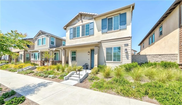 14991 Cavetto Ln, Fontana, CA 92336 - view of front of house featuring stucco siding