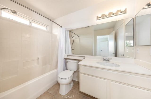 4919 Oakhurst Ave, Banning, CA 92220 - full bath with tile patterned floors, shower / bathtub combination with curtain, toilet, and vanity