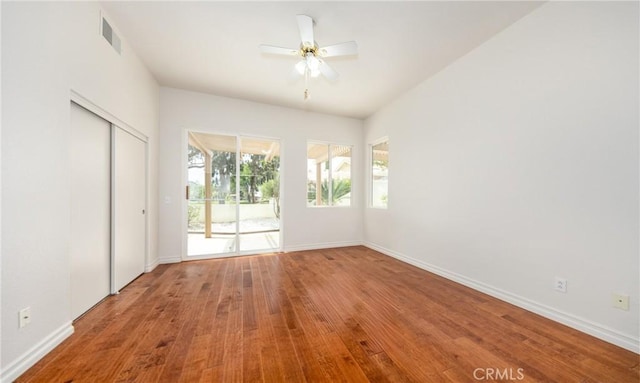 4919 Oakhurst Ave, Banning, CA 92220 - empty room with wood finished floors, baseboards, and a ceiling fan