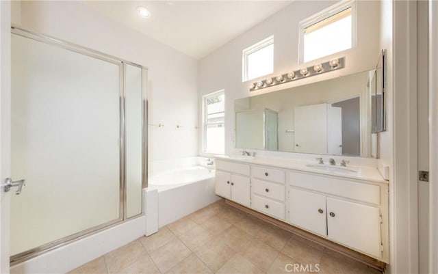 4919 Oakhurst Ave, Banning, CA 92220 - bathroom featuring a stall shower, a bath, double vanity, and tile patterned floors