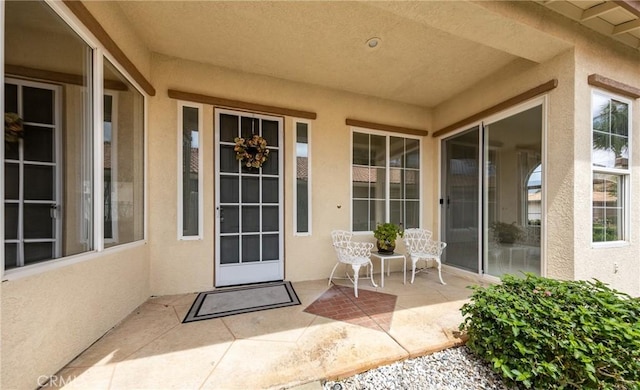 4919 Oakhurst Ave, Banning, CA 92220 - view of exterior entry with stucco siding and a patio area