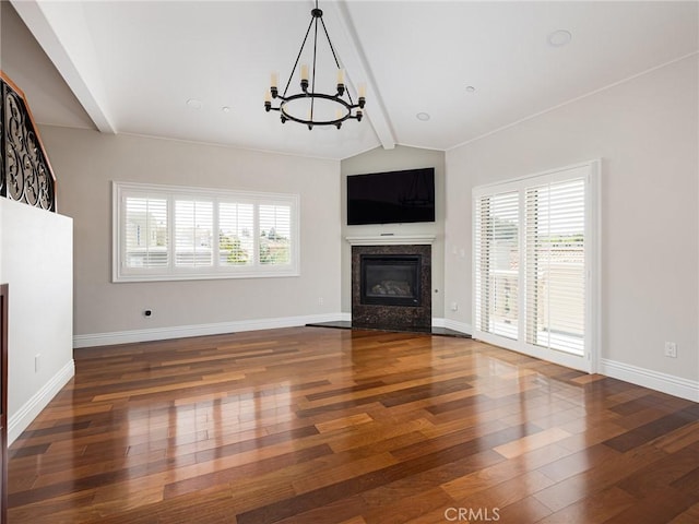 229 N Juanita Ave Unit B, Redondo Beach, CA 90277 - unfurnished living room with a fireplace, a chandelier, hardwood / wood-style flooring, and baseboards