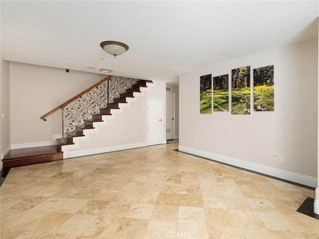 229 N Juanita Ave Unit B, Redondo Beach, CA 90277 - unfurnished living room featuring stairs and baseboards
