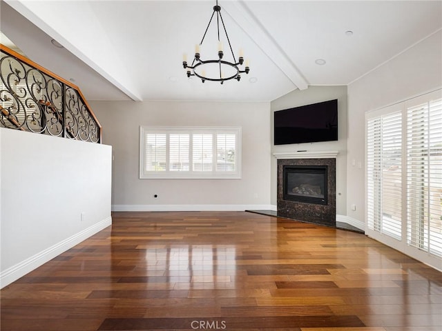 229 N Juanita Ave Unit B, Redondo Beach, CA 90277 - unfurnished living room featuring a chandelier, wood finished floors, a glass covered fireplace, and baseboards