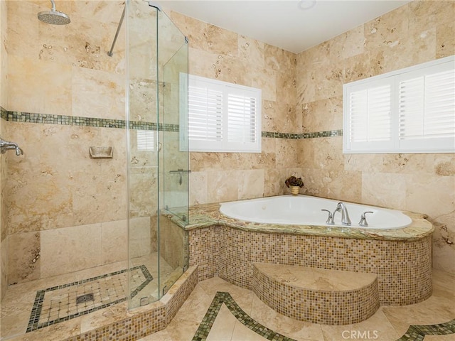 229 N Juanita Ave Unit B, Redondo Beach, CA 90277 - full bathroom featuring a garden tub, a stall shower, inlaid floor details, tile walls, and tile patterned floors