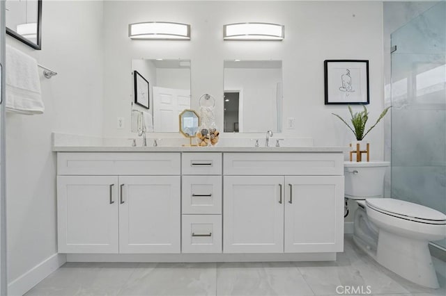 8142 Vantage Ave, North Hollywood, CA 91605 - full bathroom with toilet, marble look tiles, double vanity, and baseboards