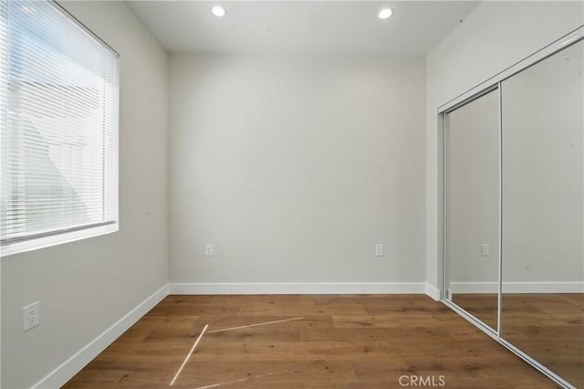 8142 Vantage Ave, North Hollywood, CA 91605 - unfurnished bedroom featuring a closet, wood finished floors, recessed lighting, and baseboards