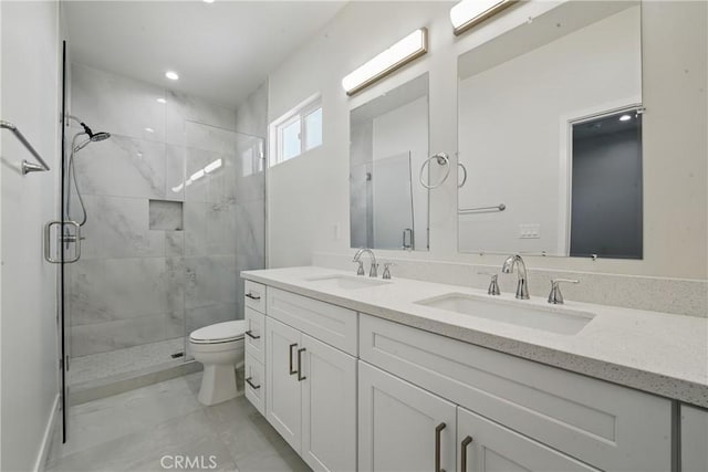 8142 Vantage Ave, North Hollywood, CA 91605 - bathroom featuring a stall shower, toilet, and double vanity