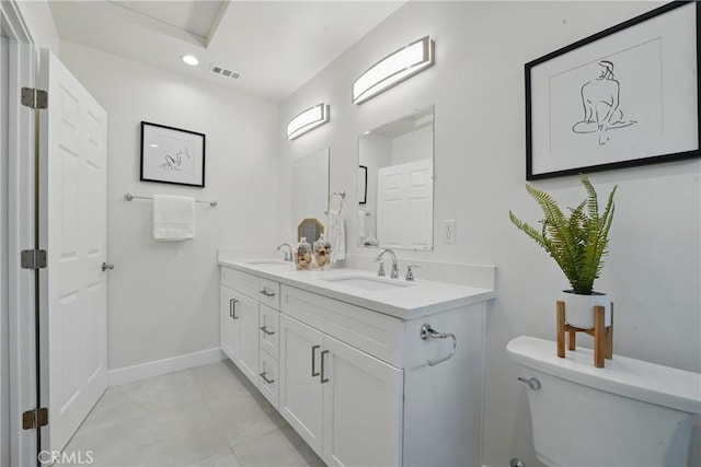 8142 Vantage Ave, North Hollywood, CA 91605 - bathroom with toilet, baseboards, recessed lighting, and double vanity