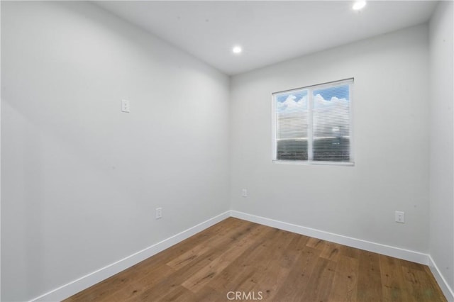 8142 Vantage Ave, North Hollywood, CA 91605 - spare room featuring baseboards, wood finished floors, and recessed lighting