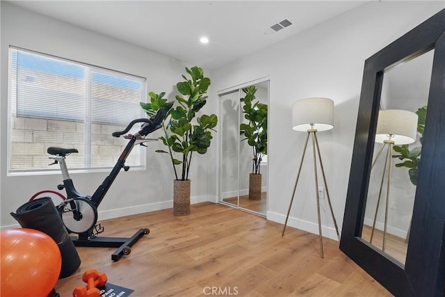 8142 Vantage Ave, North Hollywood, CA 91605 - exercise area featuring wood finished floors, baseboards, and recessed lighting