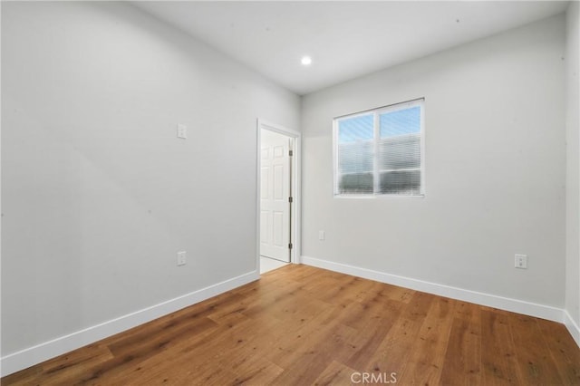 8142 Vantage Ave, North Hollywood, CA 91605 - empty room with baseboards, wood finished floors, and recessed lighting