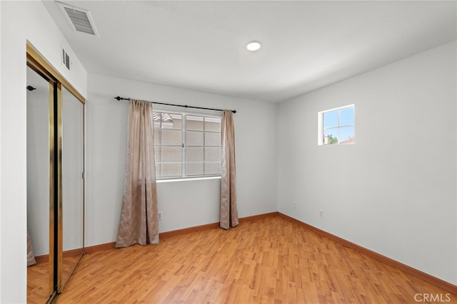 15283 Rousseau Ln, La Mirada, CA 90638 - unfurnished bedroom featuring light wood finished floors and a closet
