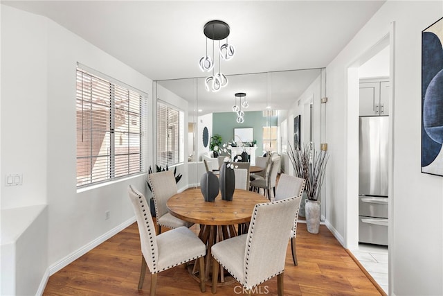 15283 Rousseau Ln, La Mirada, CA 90638 - dining area featuring light wood finished floors and baseboards