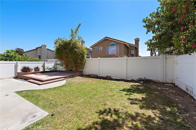 15283 Rousseau Ln, La Mirada, CA 90638 - fenced backyard featuring a patio and a wooden deck