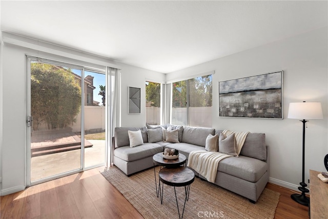 15283 Rousseau Ln, La Mirada, CA 90638 - living room with plenty of natural light and wood finished floors