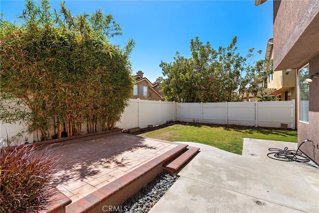 15283 Rousseau Ln, La Mirada, CA 90638 - fenced backyard with a patio