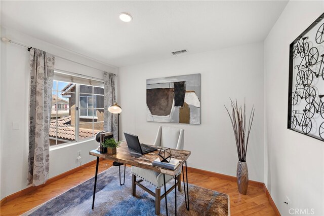 15283 Rousseau Ln, La Mirada, CA 90638 - home office featuring wood finished floors, baseboards, and recessed lighting