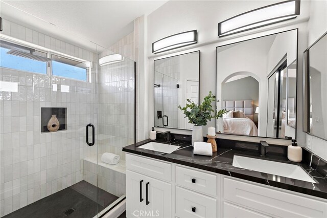 15283 Rousseau Ln, La Mirada, CA 90638 - bathroom with ensuite bathroom, a stall shower, and double vanity