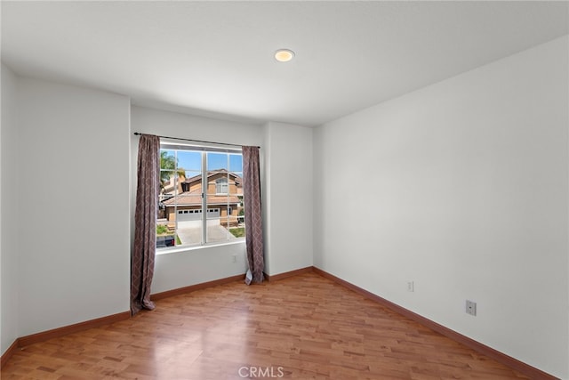 15283 Rousseau Ln, La Mirada, CA 90638 - spare room with light wood-style flooring and recessed lighting