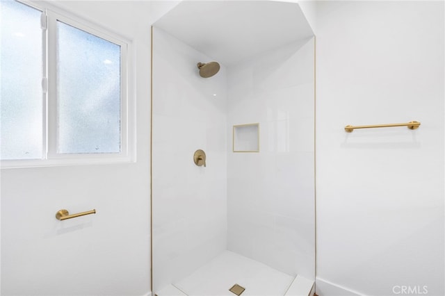2291 Halcyon Way, Pomona, CA 91767 - full bath featuring a tile shower, plenty of natural light, and baseboards
