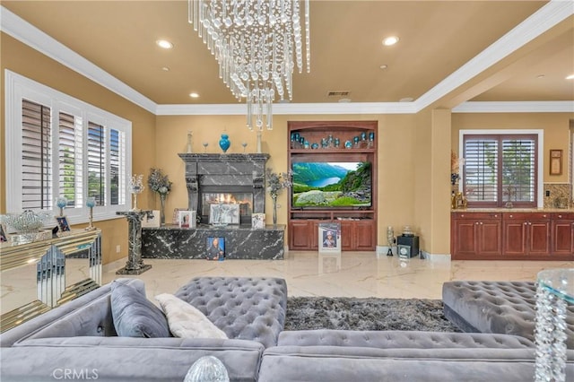 living room with recessed lighting, marble tiled flooring, ornamental molding, and a premium fireplace