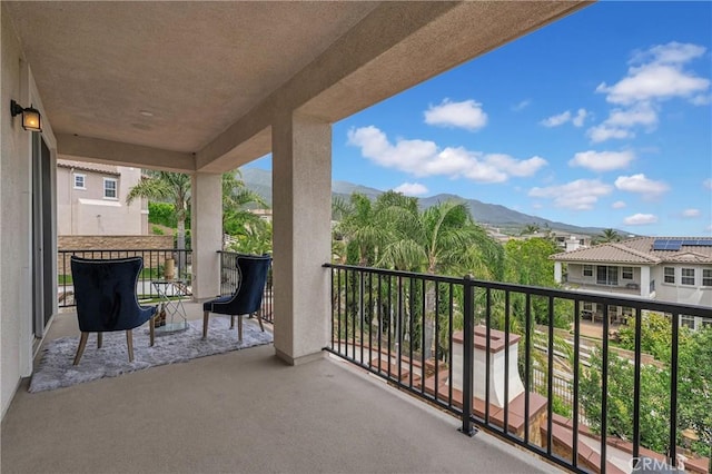 balcony featuring a mountain view
