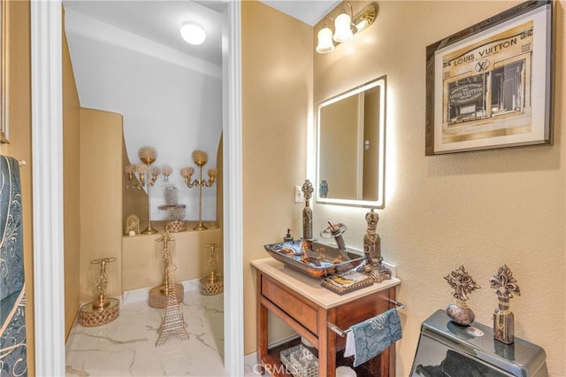 hall featuring marble finish flooring