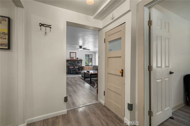 21964 Mojave River Rd, Cedarpines Park, CA 92322 - corridor featuring wood finished floors and baseboards