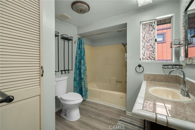 21964 Mojave River Rd, Cedarpines Park, CA 92322 - full bath featuring wood finished floors, toilet, shower / bath combo, and vanity
