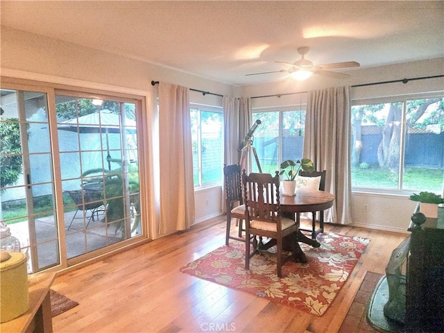3889 Acorn Ct, Simi Valley, CA 93063 - dining room featuring light wood-style floors, ceiling fan, and healthy amount of natural light