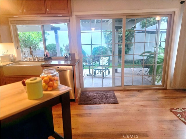 3889 Acorn Ct, Simi Valley, CA 93063 - doorway to outside with wood finished floors, a sink, and healthy amount of natural light