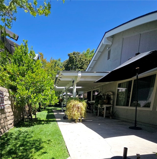 3889 Acorn Ct, Simi Valley, CA 93063 - view of green lawn with a patio area