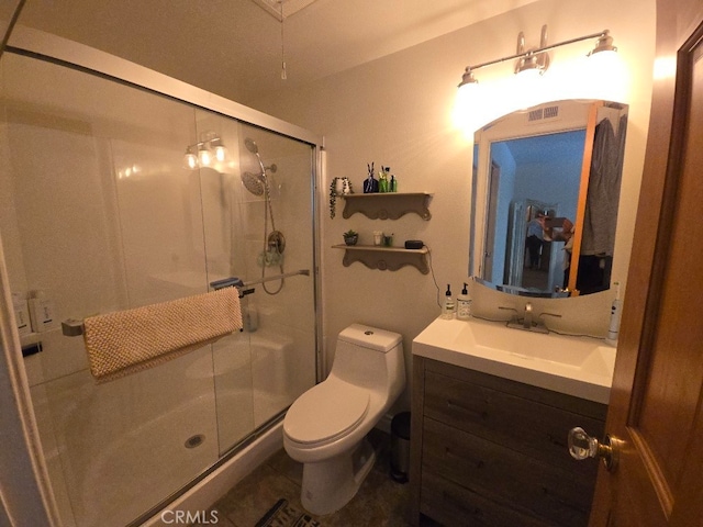 3889 Acorn Ct, Simi Valley, CA 93063 - bathroom featuring vanity, toilet, and a stall shower
