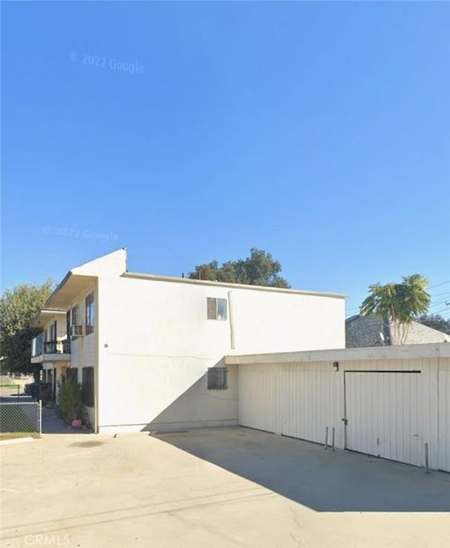 270 E 6th St, Pomona, CA 91766 - view of side of home with stucco siding
