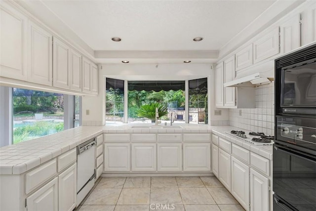 2484 Chauncy Pl, Riverside, CA 92506 - kitchen featuring white appliances, a sink, tile countertops, white cabinets, and decorative backsplash
