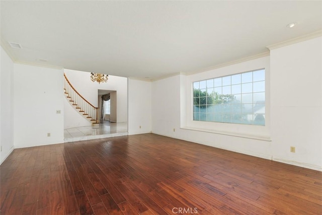 2484 Chauncy Pl, Riverside, CA 92506 - spare room featuring wood finished floors, ornamental molding, stairs, and healthy amount of natural light