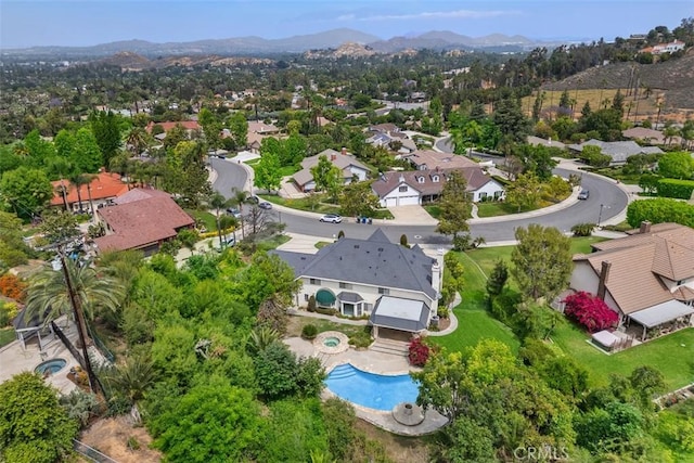 2484 Chauncy Pl, Riverside, CA 92506 - aerial view of residential area featuring a mountainous background and a pool area
