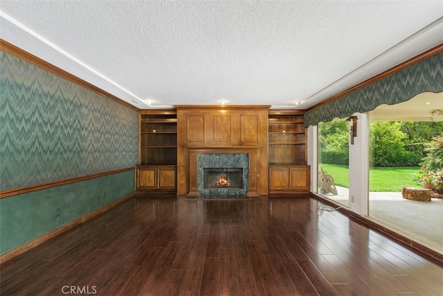 2484 Chauncy Pl, Riverside, CA 92506 - unfurnished living room featuring wallpapered walls, a textured ceiling, a premium fireplace, wood finished floors, and ornamental molding