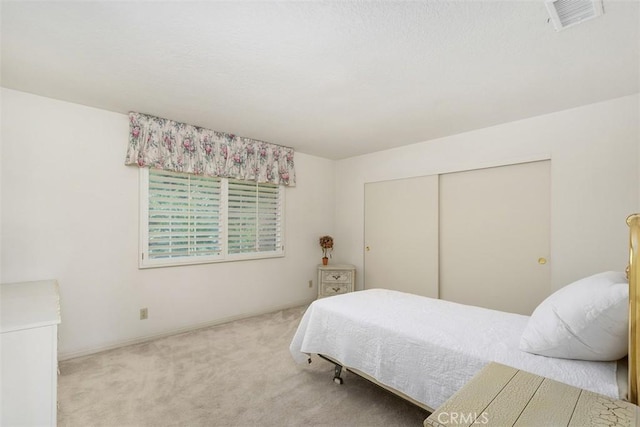2484 Chauncy Pl, Riverside, CA 92506 - bedroom featuring carpet flooring, a closet, and baseboards