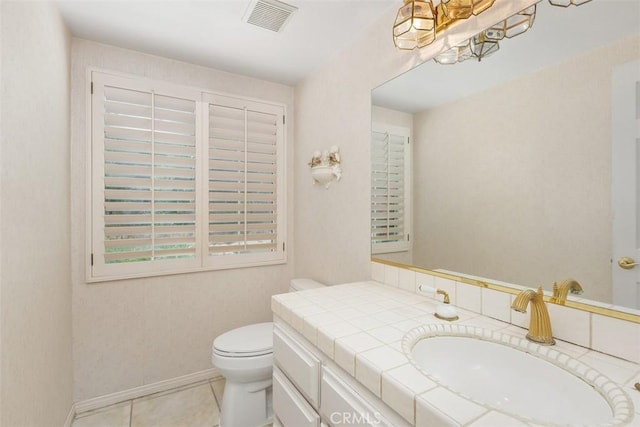 2484 Chauncy Pl, Riverside, CA 92506 - bathroom featuring toilet, vanity, tile patterned flooring, and baseboards
