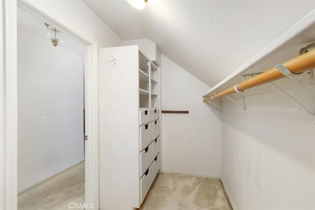 2484 Chauncy Pl, Riverside, CA 92506 - spacious closet featuring lofted ceiling and light carpet