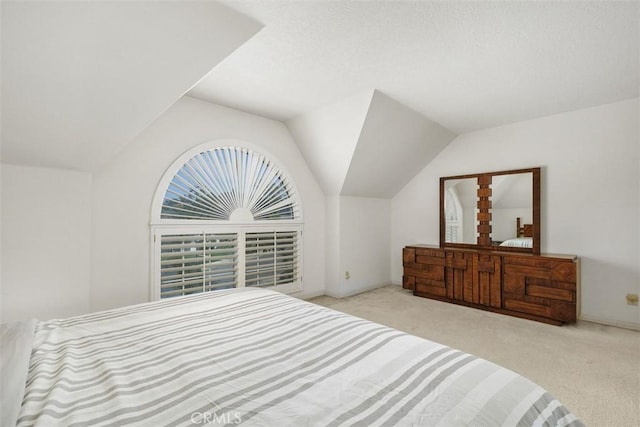 2484 Chauncy Pl, Riverside, CA 92506 - carpeted bedroom with vaulted ceiling and baseboards